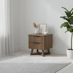 Wooden nightstand with decorative items in a minimalistic room 