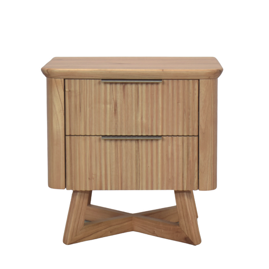 Front view of Kea bedside table with ribbed drawers and X-shaped base in Light Oak