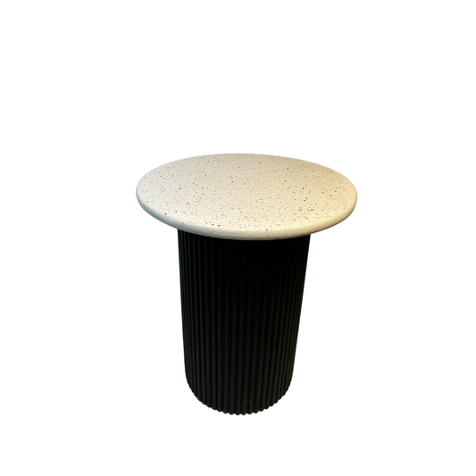 Front view of Kea bedside table with terrazzo top and ribbed cylindrical base in Black finish


